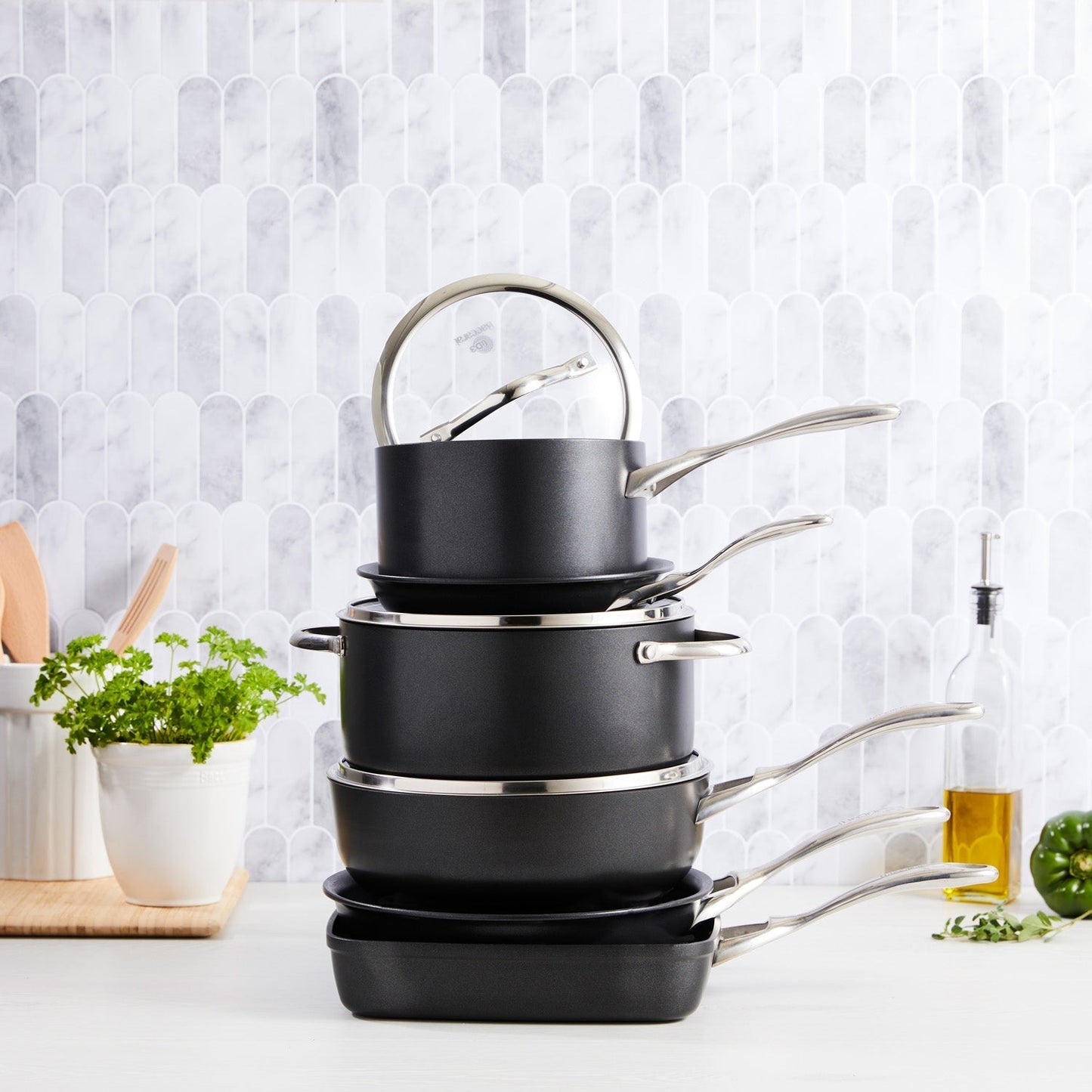 a stylish cookware set with sleek non-stick surfaces and matching lids in vibrant colours - Baccarat