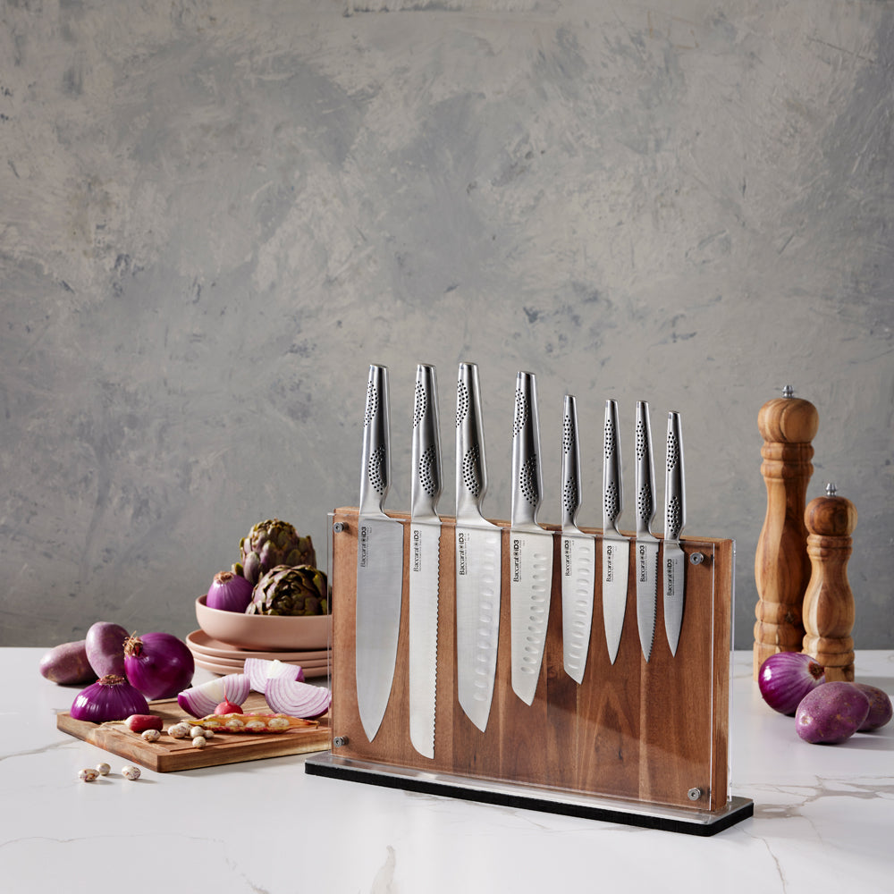 Chopping board with onions and a knife beside knife block - Baccarat id3 Ryu Knife Block 9-Piece