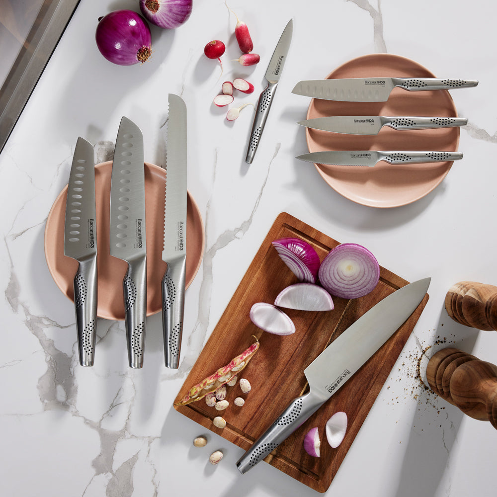 Chopping board with onions and a knife beside knife block - Baccarat id3 Ryu Knife Block 9-Piece