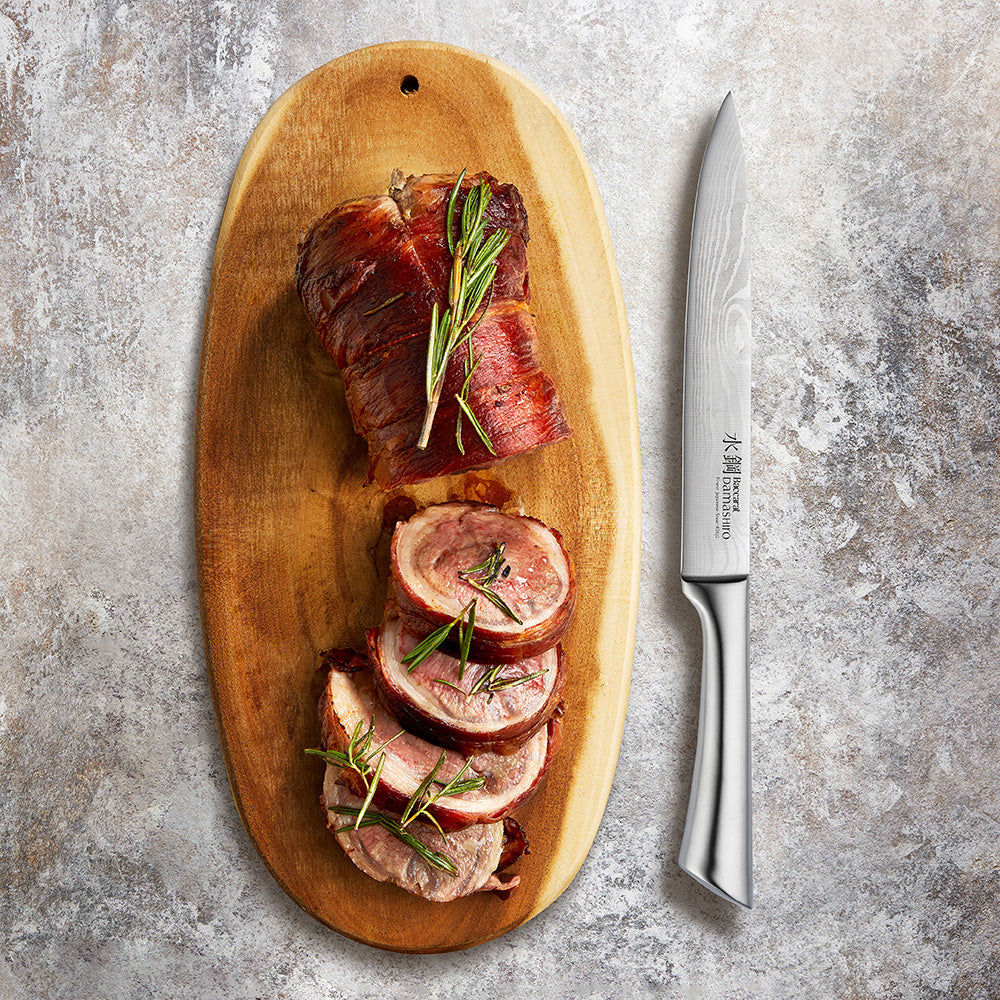 A beautifully sliced roast on wooden board with sharp blade - Baccarat Damashiro Carving Knife 20cm