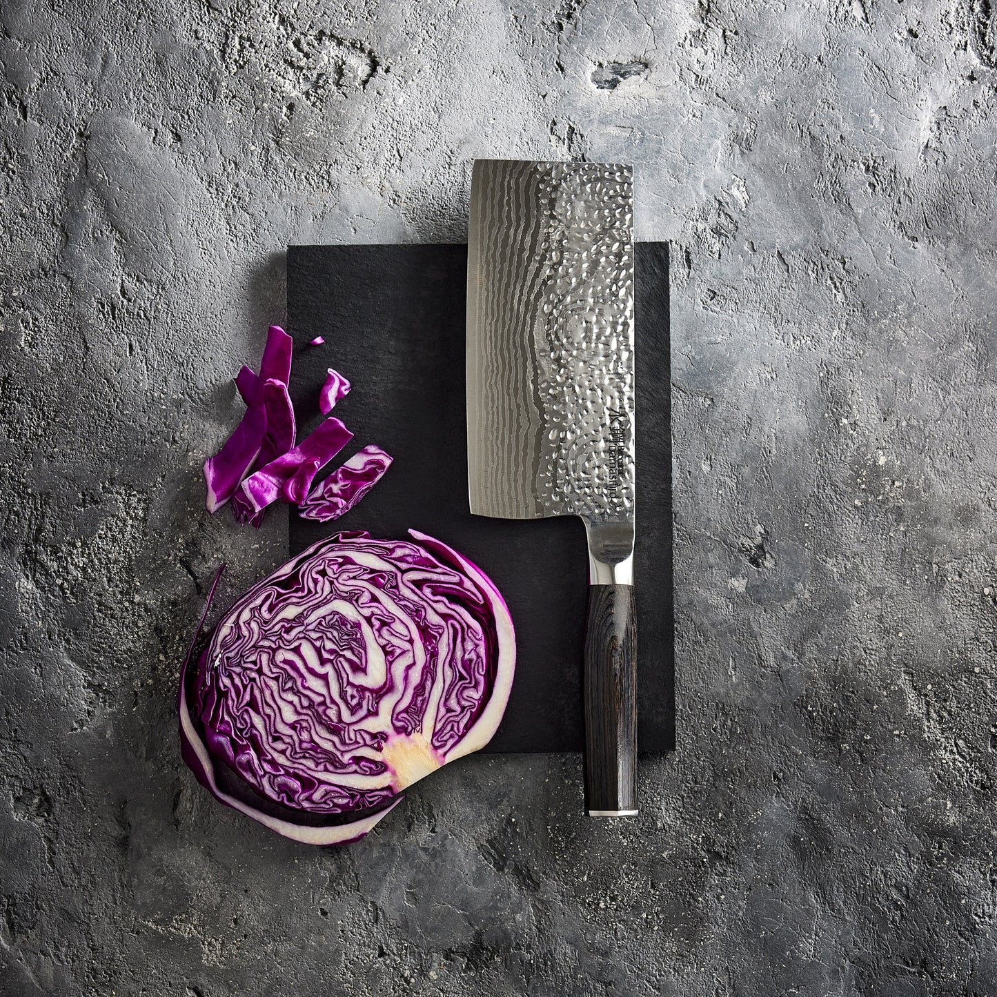 A finely crafted cleaver with a sharp blade and elegant handle design - Baccarat damashiro emperor