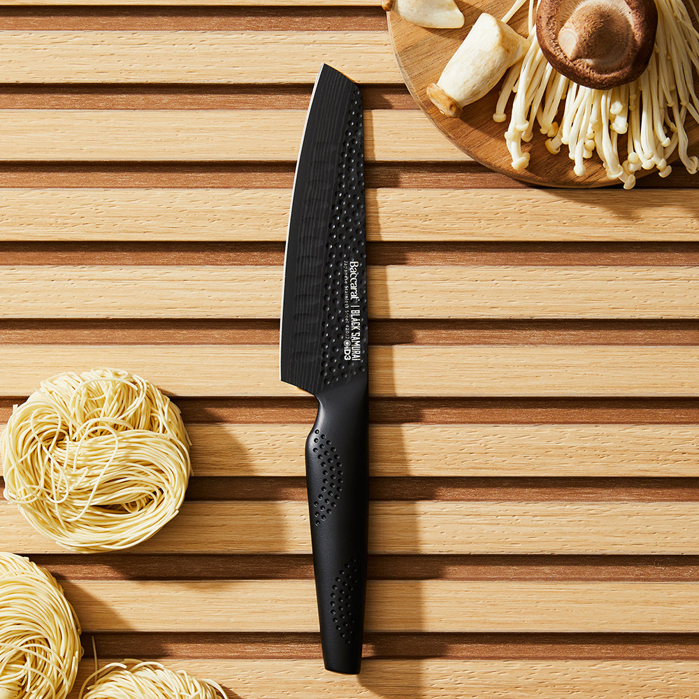 A sharp versatile santoku knife with a black handle and blade texture - Baccarat ID3 Black Samurai