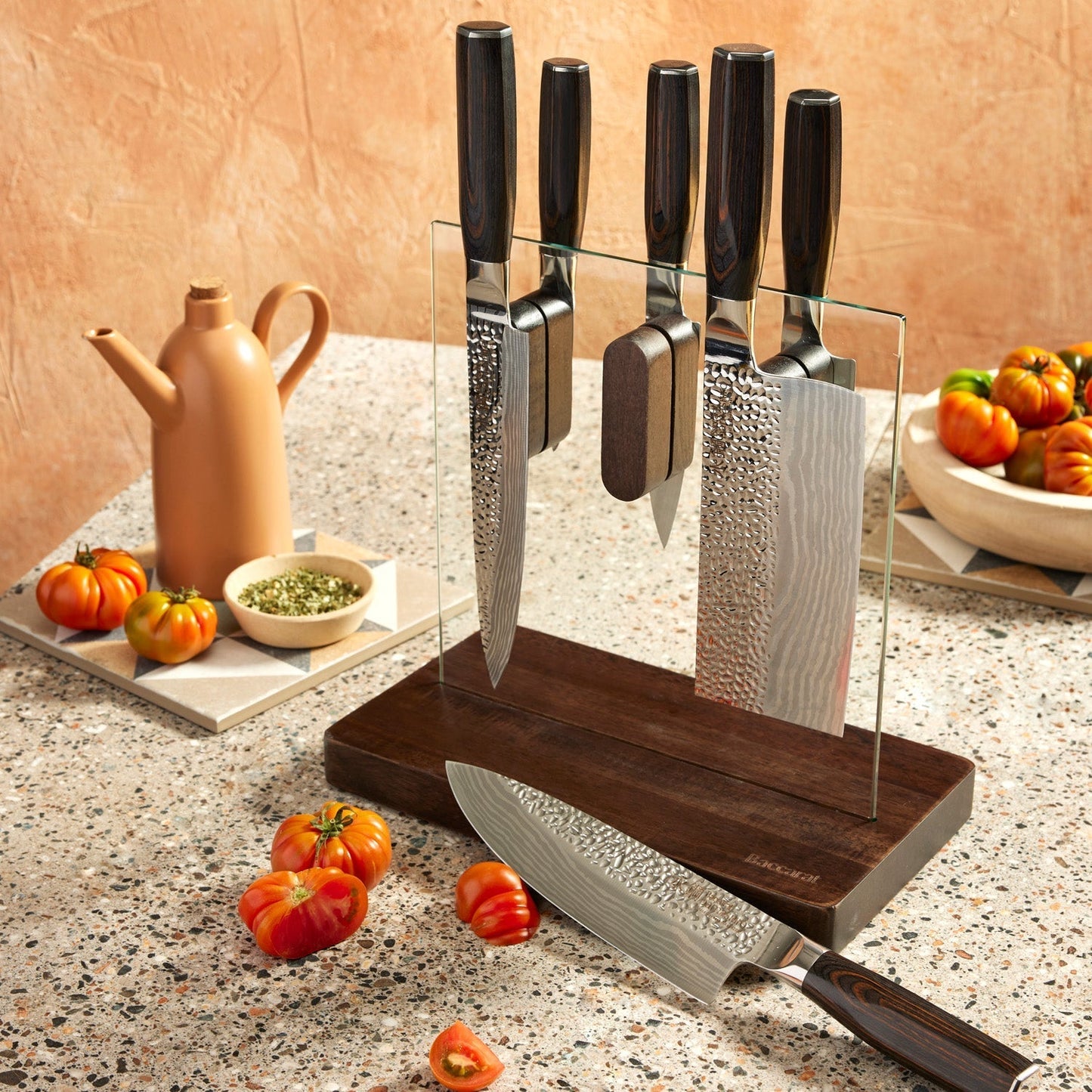 A knife on a wooden board with sleek blades on a countertop - Part of 7-piece knife block - Baccarat
