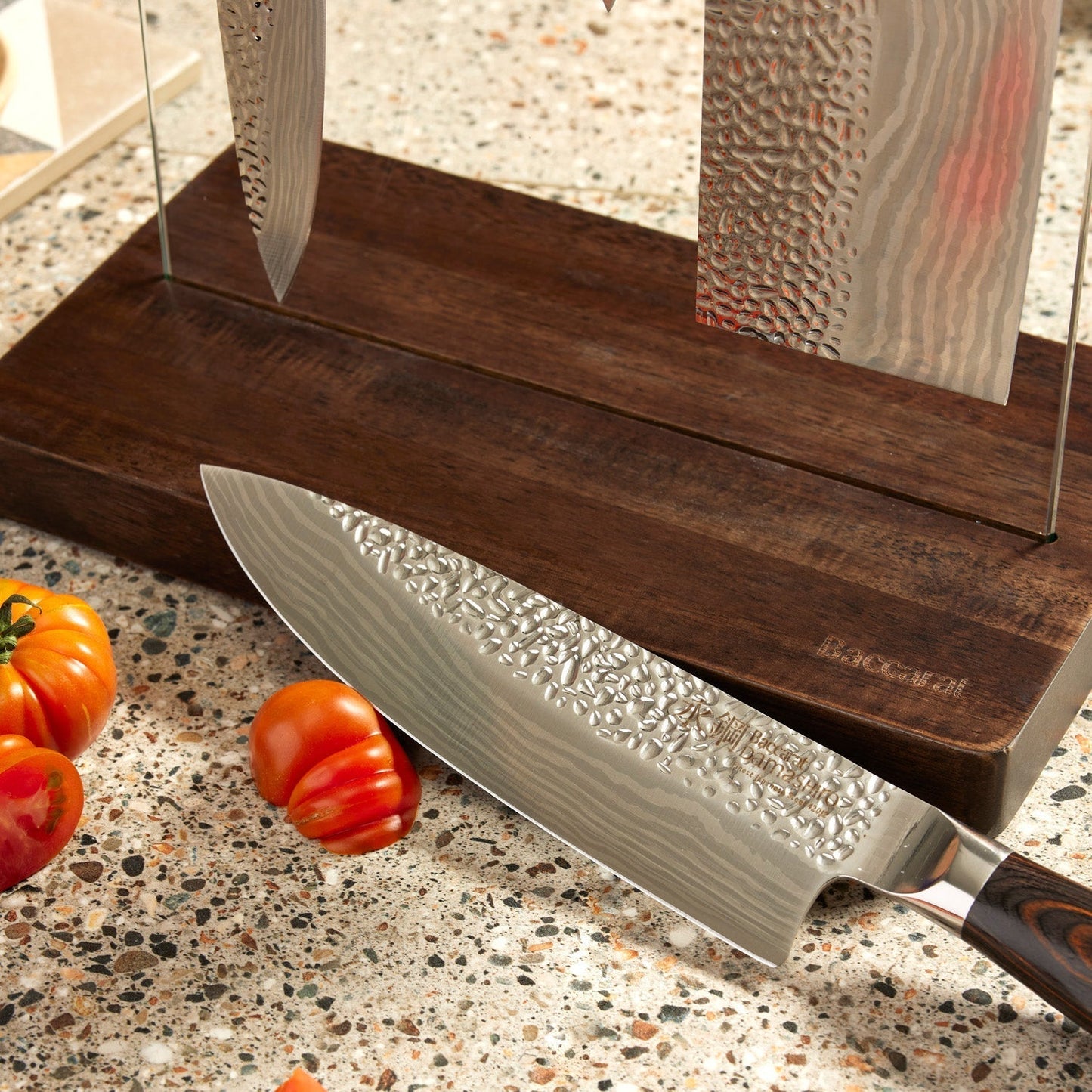 A knife on a wooden board with sleek blades on a countertop - Part of 7-piece knife block - Baccarat