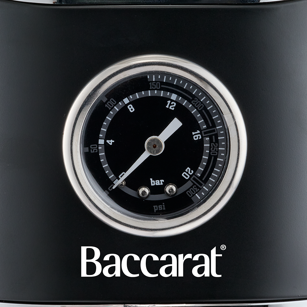Black pressure gauge with 'Baccarat' branding on a black background