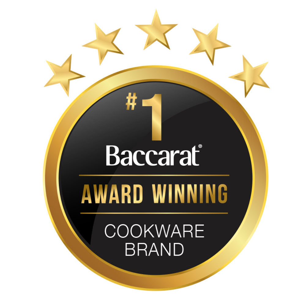 A black frying pan with vegetables and a fried egg hard anodised cookware 22cm fry pan - Baccarat