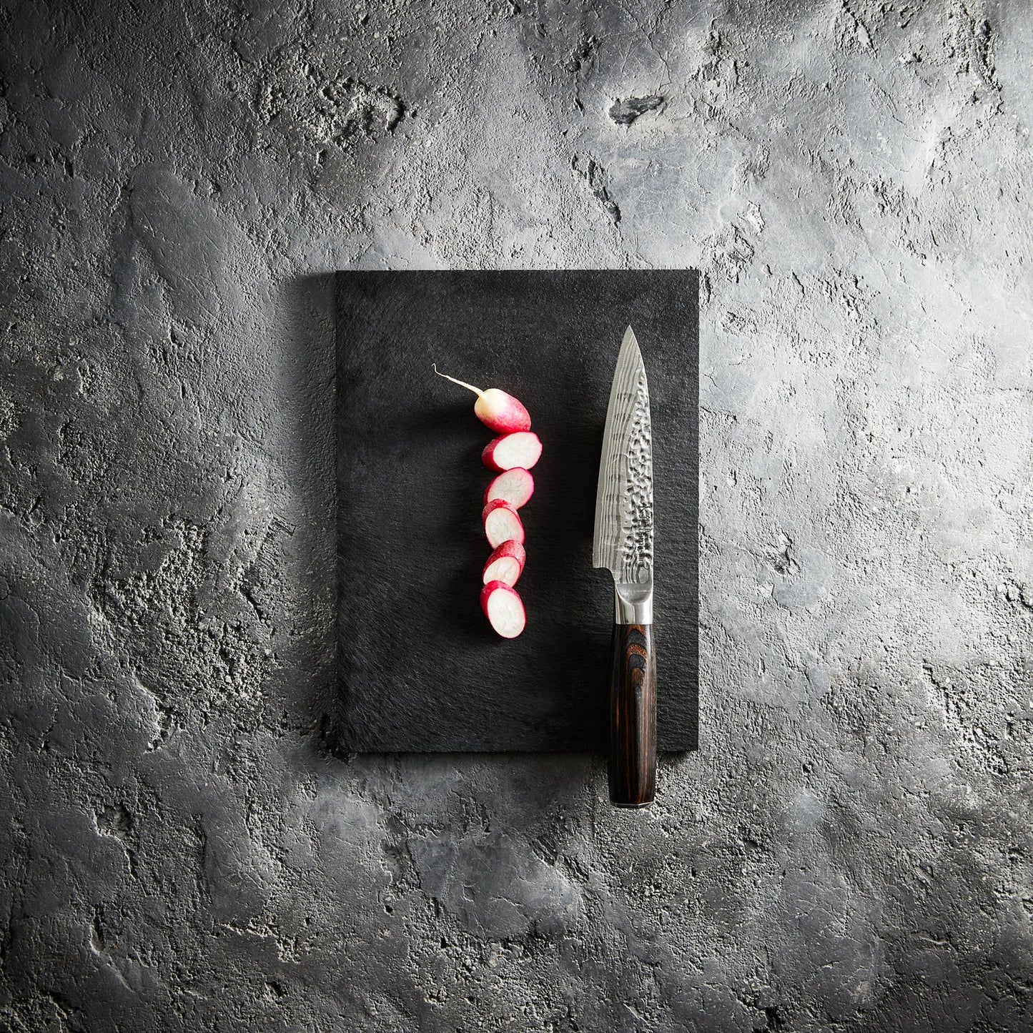 A sleek beautifully crafted carving knife with a fine edge and ergonomic handle - Baccarat Damashiro