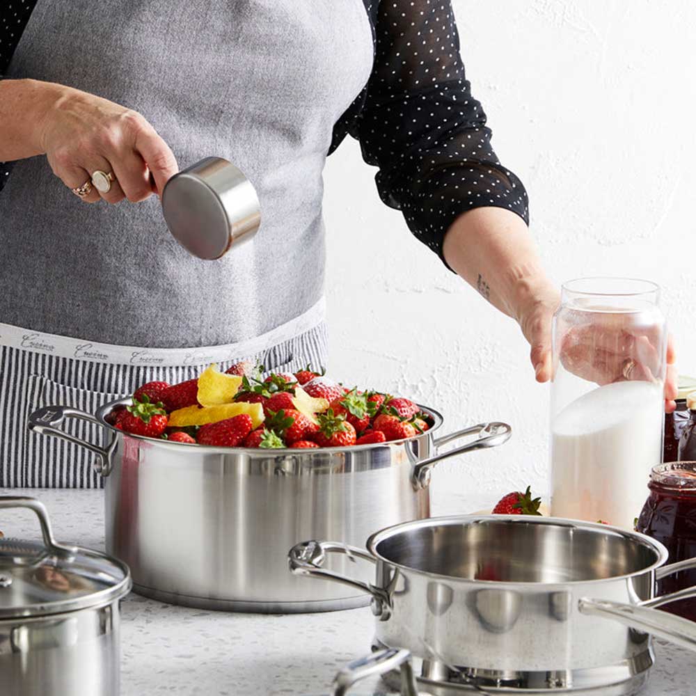 silver cookware set in a box containing pots and pans stainless steel cookware set - Wolfgang Starke