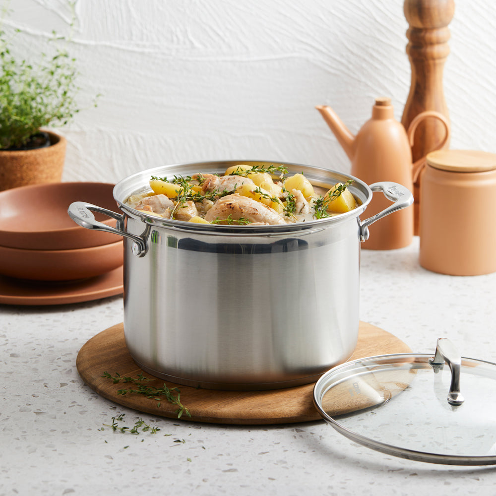 silver cookware set in a box containing pots and pans stainless steel cookware set - Wolfgang Starke