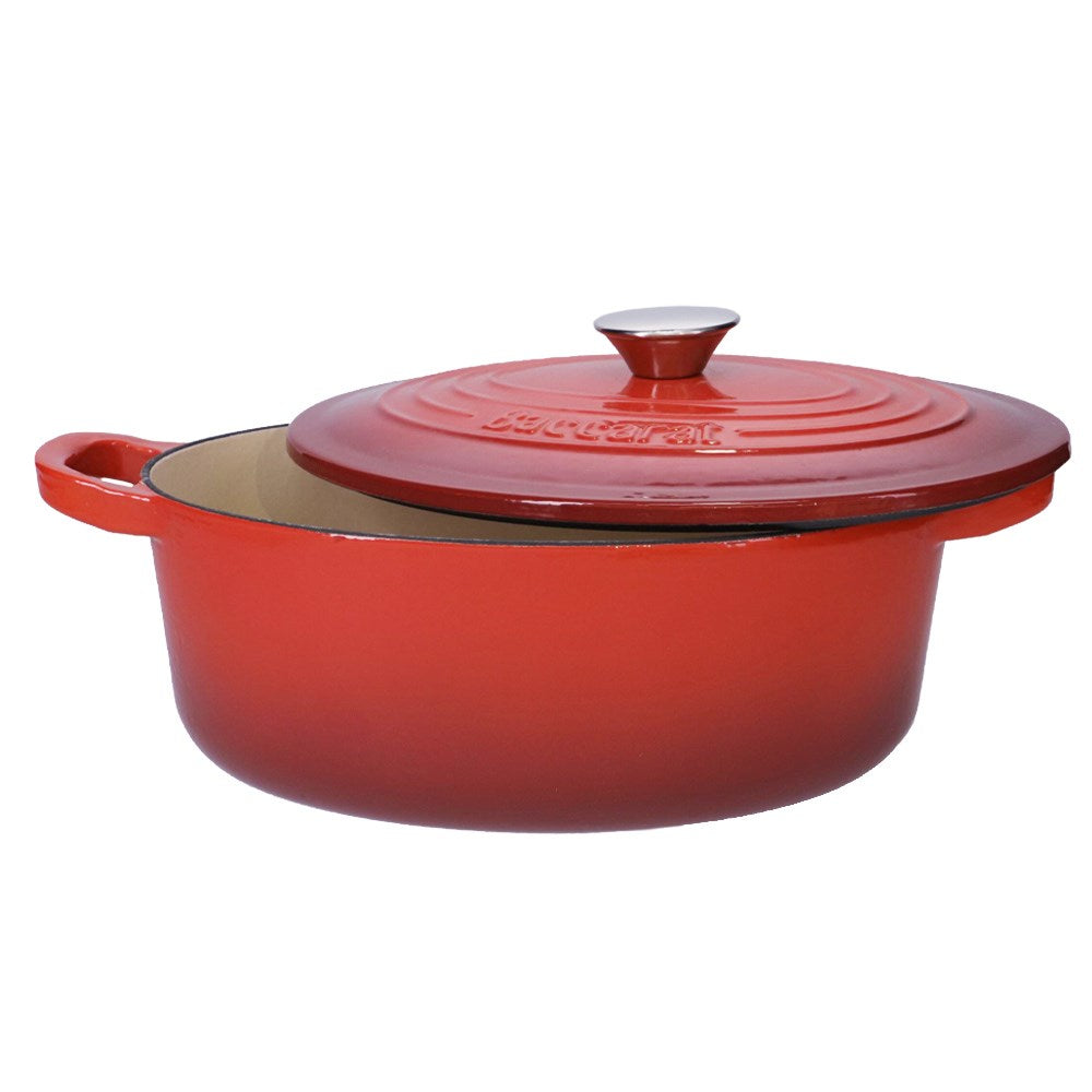 Oval cast iron French oven with lid in red color for cooking and serving - Baccarat Le Connoisseur