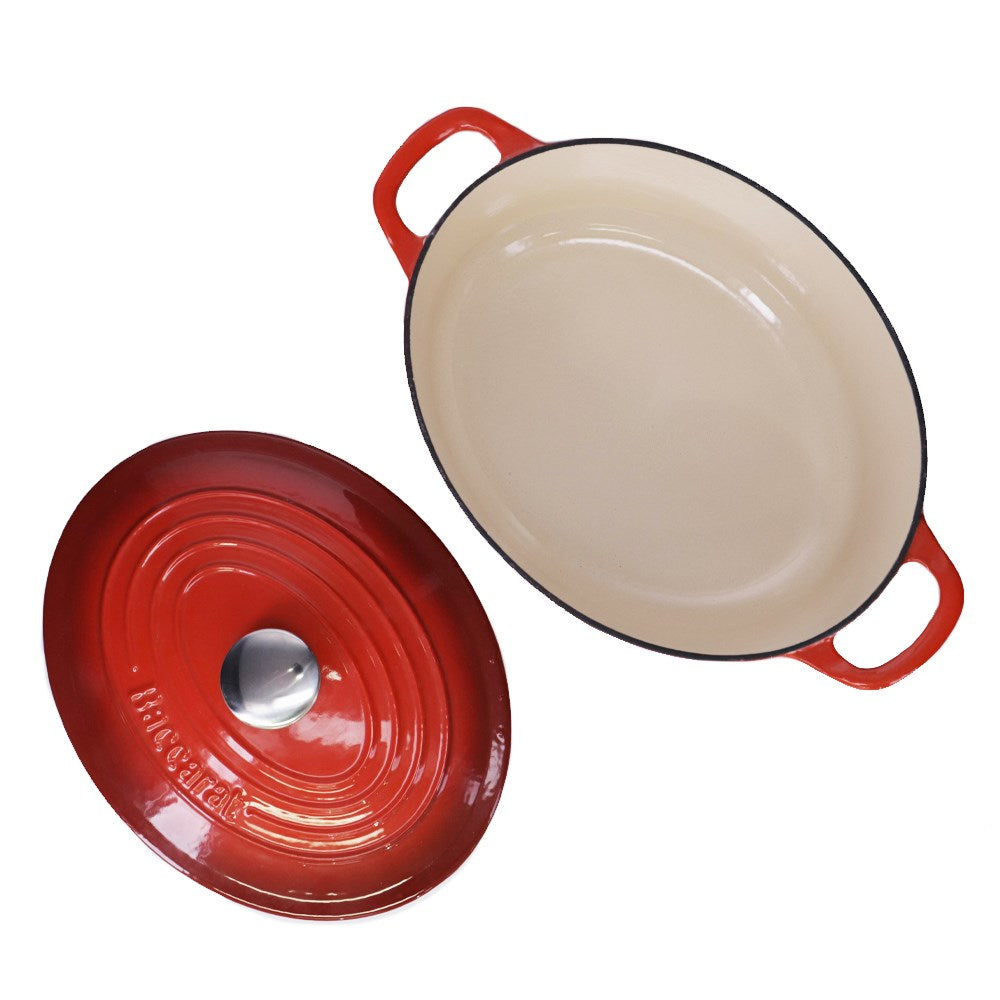 Oval cast iron French oven with lid in red color for cooking and serving - Baccarat Le Connoisseur