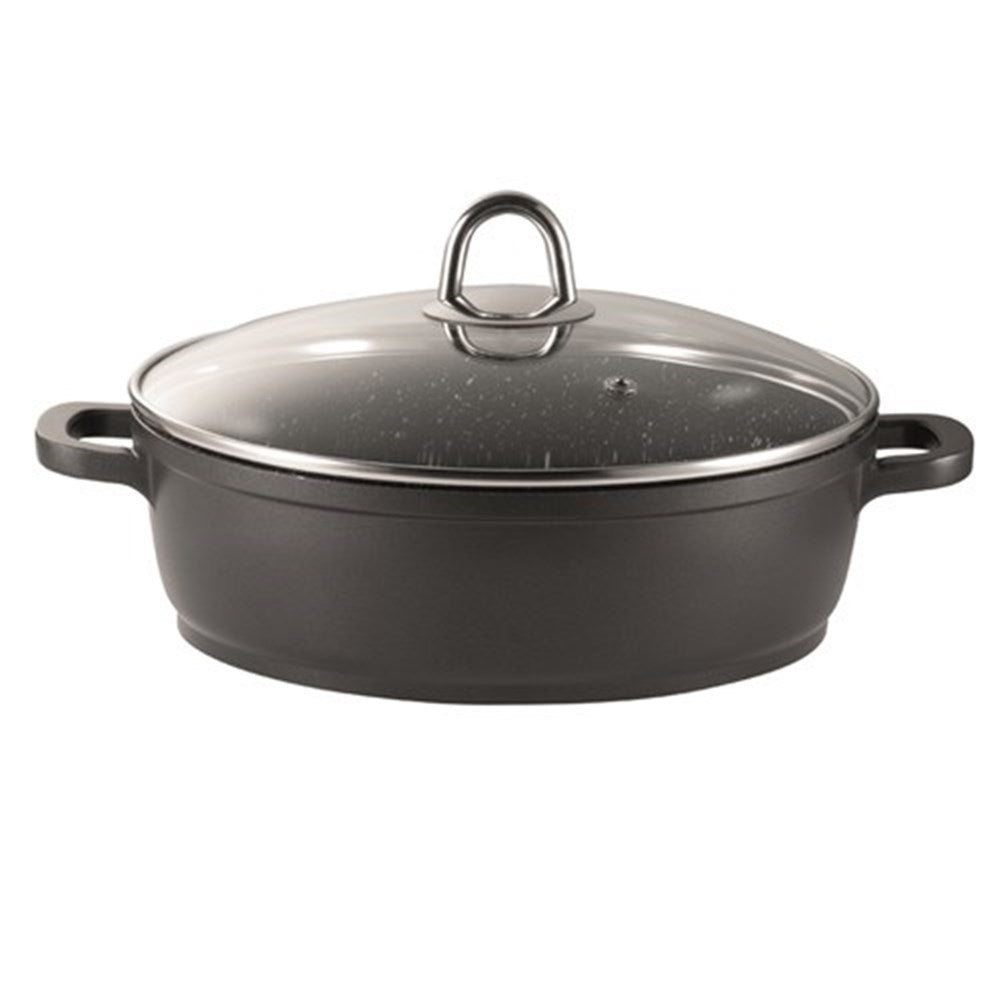 Overhead view of a saute pan filled with fresh vegetables and sliced peppers - Baccarat