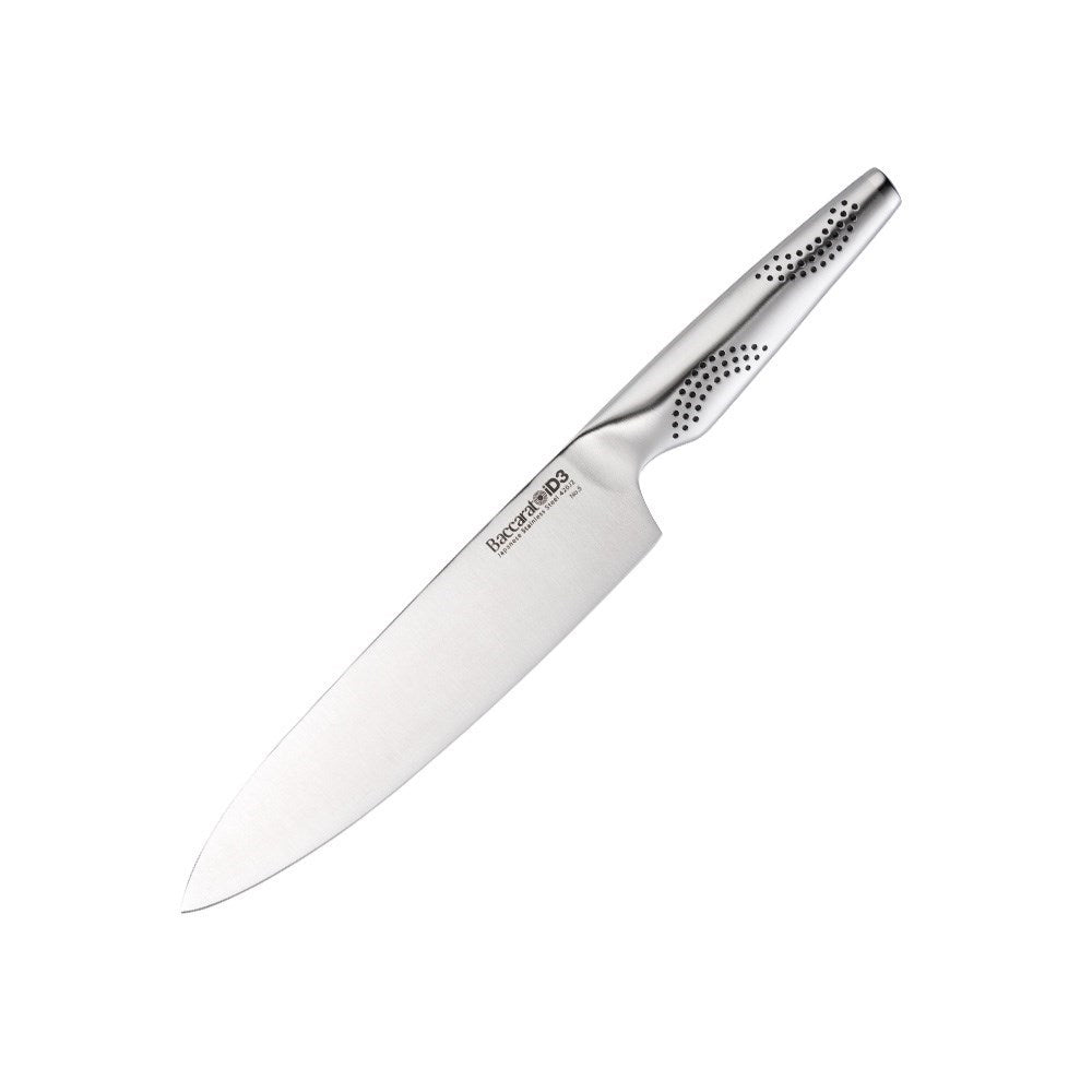 A person slicing vegetables on a wooden board with a chef's knife - Baccarat id3 chefs knife 20cm