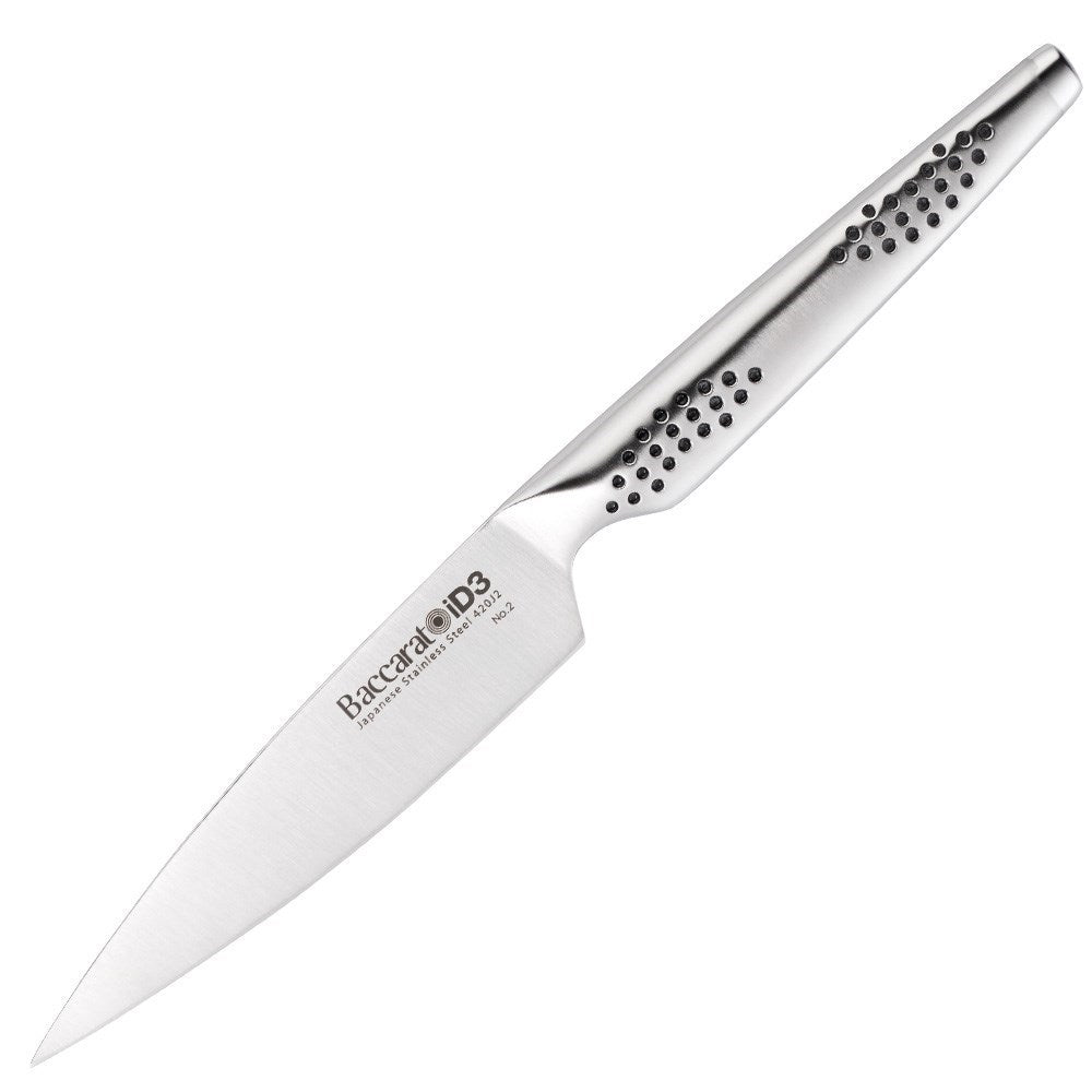 Chopped vegetables on a wooden board with fried veggies in a pan - Baccarat id3 11cm Utility Knife