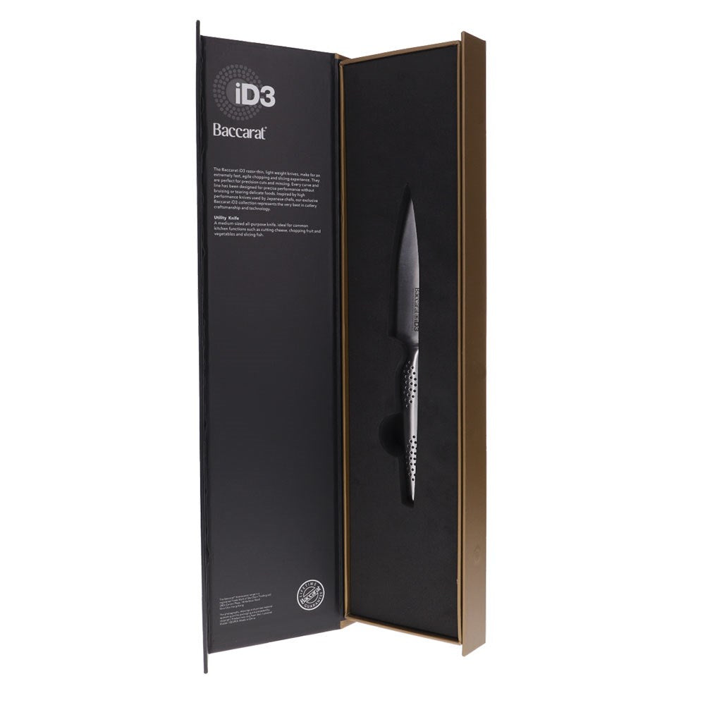 Chopped vegetables on a wooden board with fried veggies in a pan - Baccarat id3 11cm Utility Knife