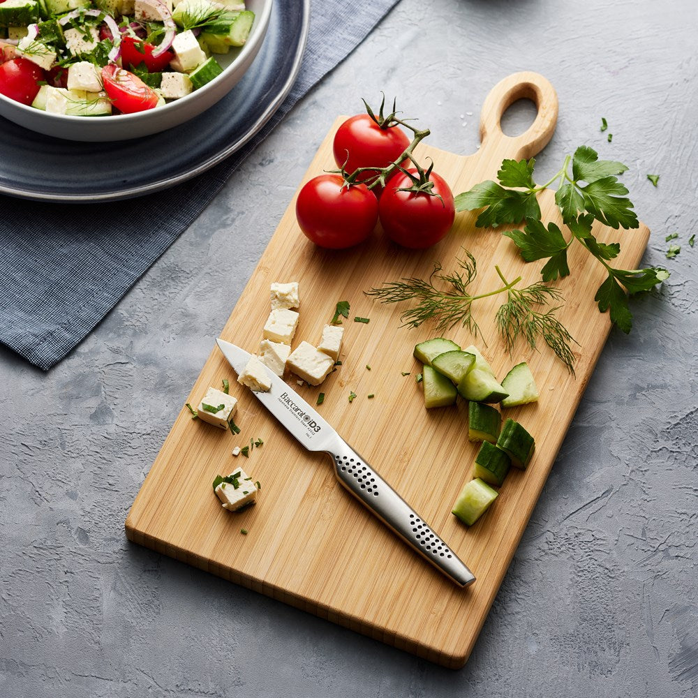 Fresh tomatoes and herbs on a chopping board with a sleek knife - Baccarat id3 Paring Knife 9cm