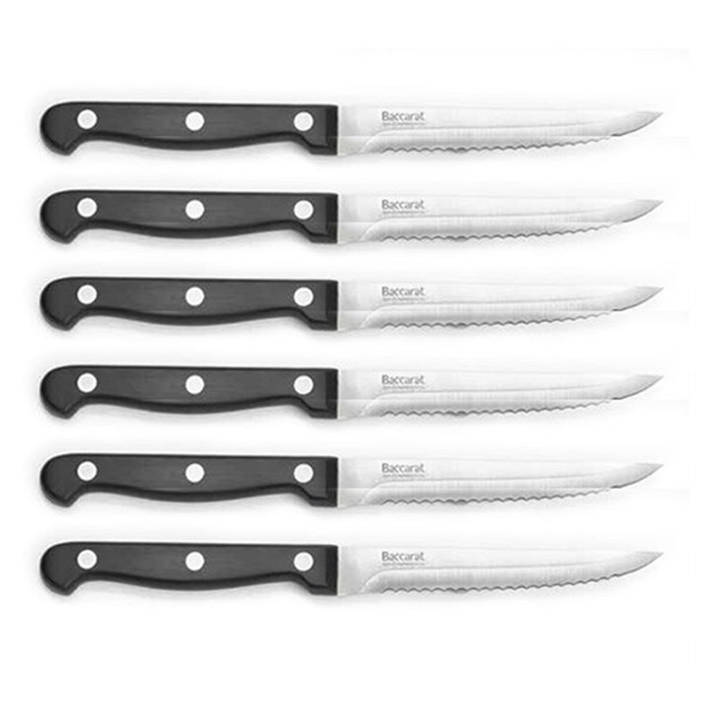 Six steak knives with black handles elegantly arranged outside packaging - Baccarat