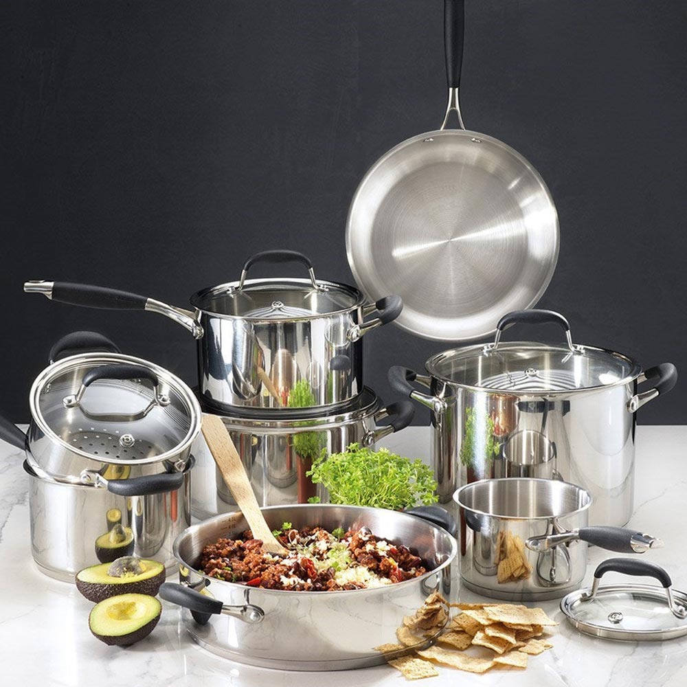 A 20-cm Baccarat Capri Saucepan with a lid filled with corn, chilli, and spices on a countertop