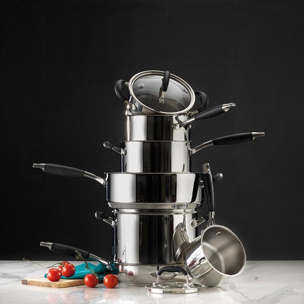 Shiny stainless steel pots, pans arranged on kitchen counter capri stockpot with lid 8 2l - Baccarat