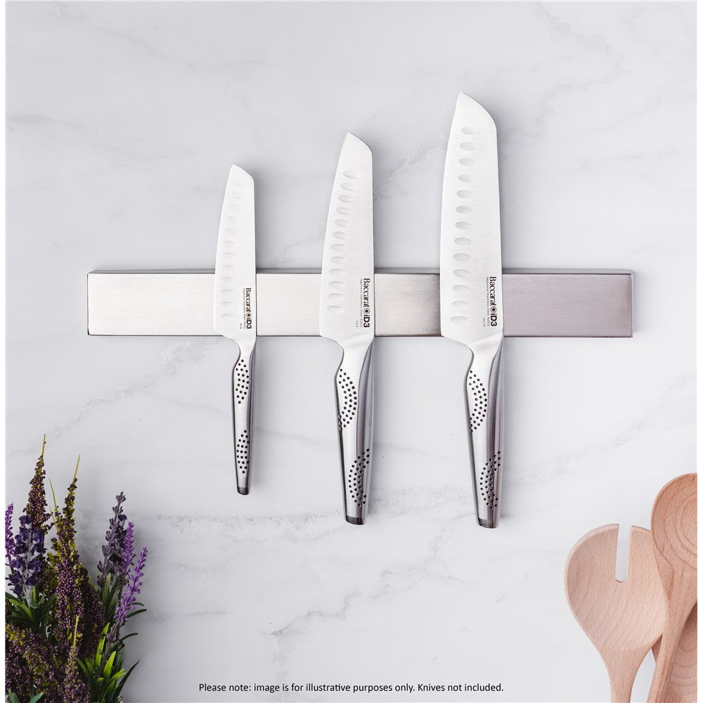 Magnetic stainless steel knife holder with five silver knives on a marble surface - Baccarat id3