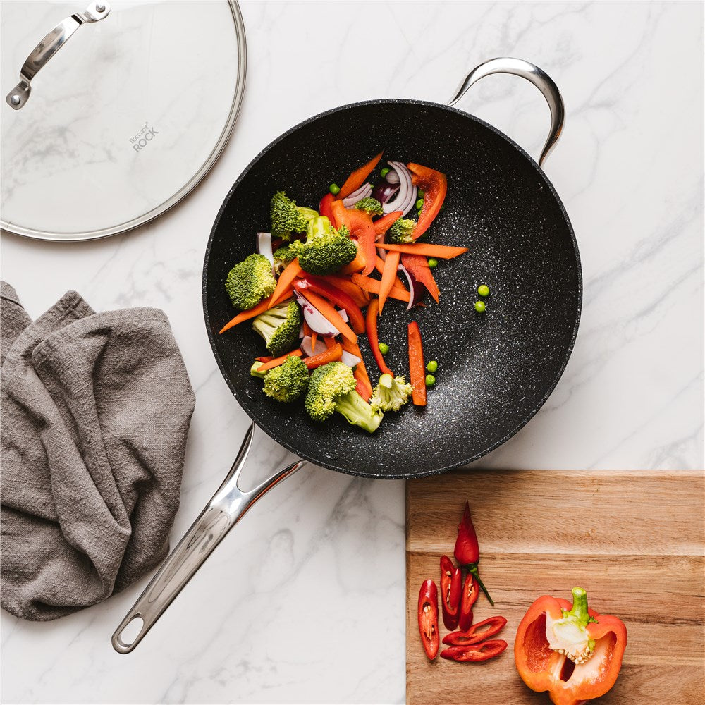 A durable saucepan with a lid featuring a sturdy handle gray granite finish - Baccarat