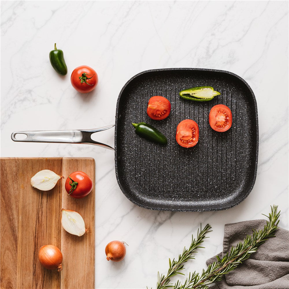 Aerial view of vibrant tomatoes and colourful peppers on marble - Baccarat Rock Grill Pan 28 cm