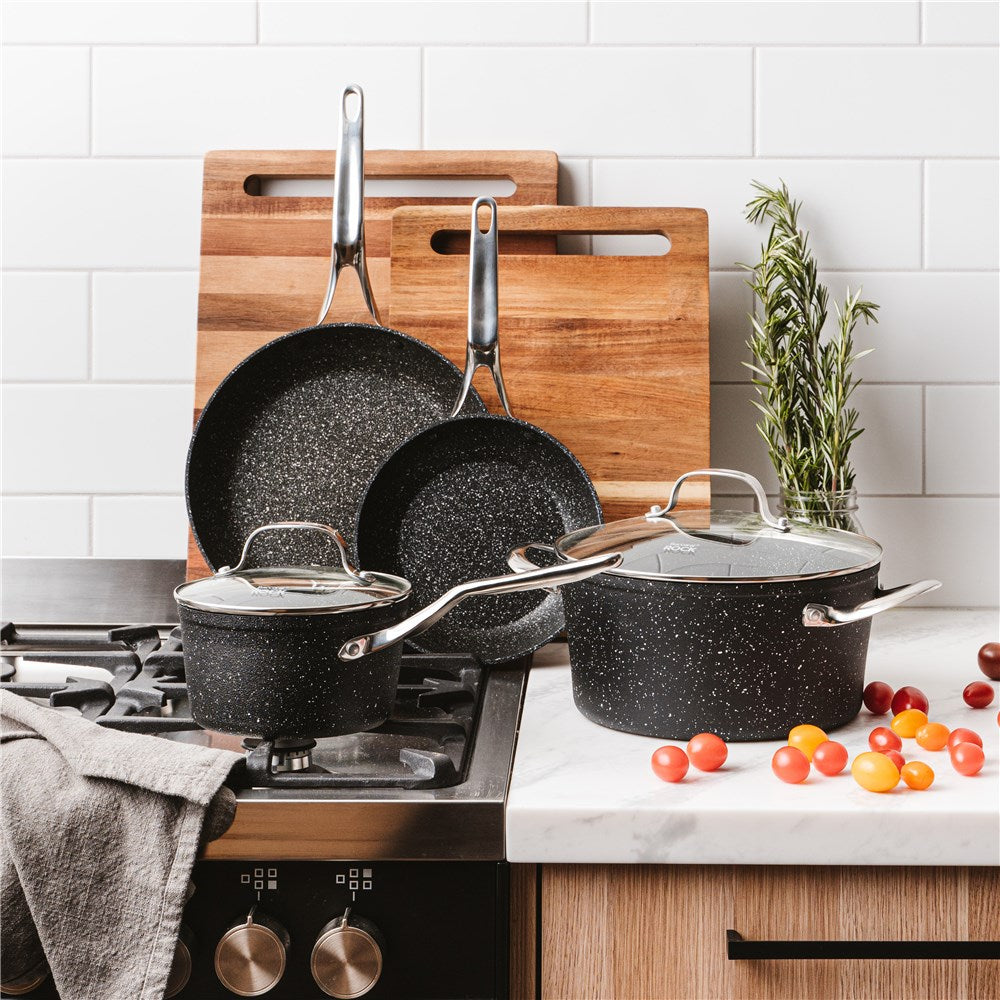 Non-stick cookware set featuring stylish pots and pans with vibrant vegetables - Baccarat Rock