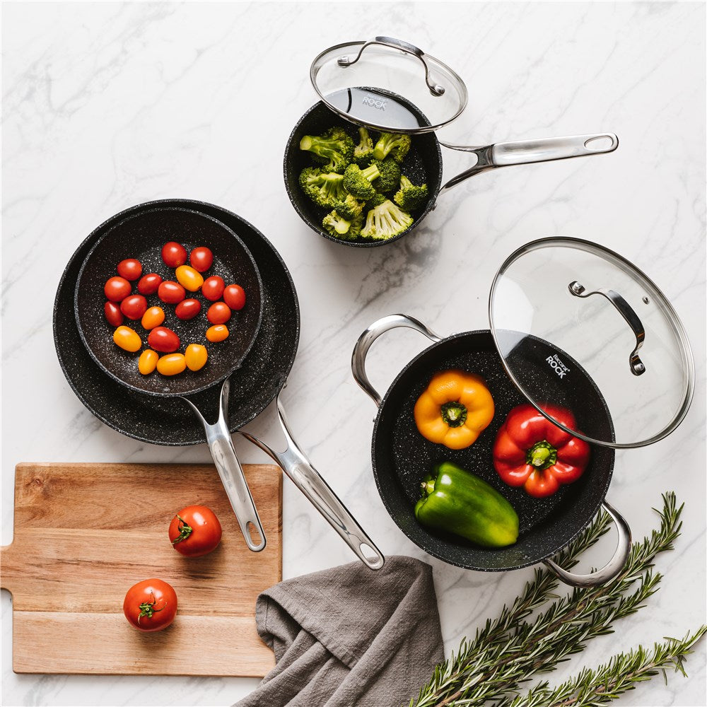 Non-stick cookware set featuring stylish pots and pans with vibrant vegetables - Baccarat Rock