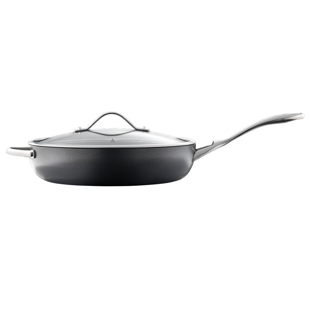 Vibrant cooked meals arranged on a wooden table in a 30cm non stick saute pan with lid - Baccarat