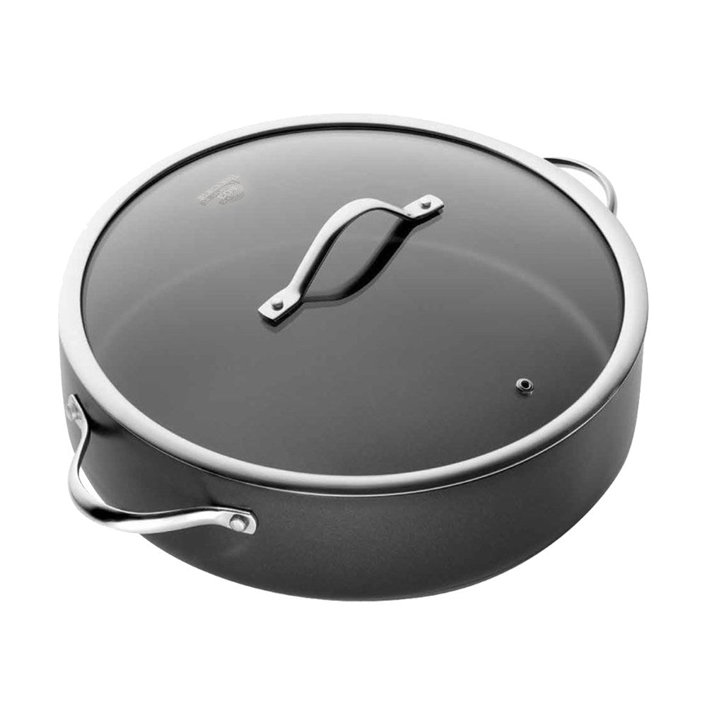 Saute pan with lid and cooking icons in black and white with Lifetime Guarantee text - Baccarat