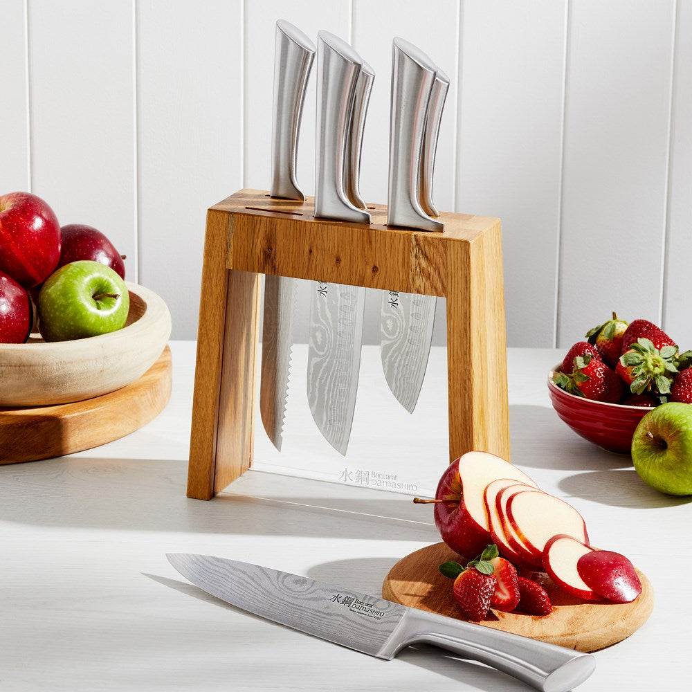 Elegant wooden board displaying sliced apples and strawberries with knives - Baccarat Damashiro Mizu