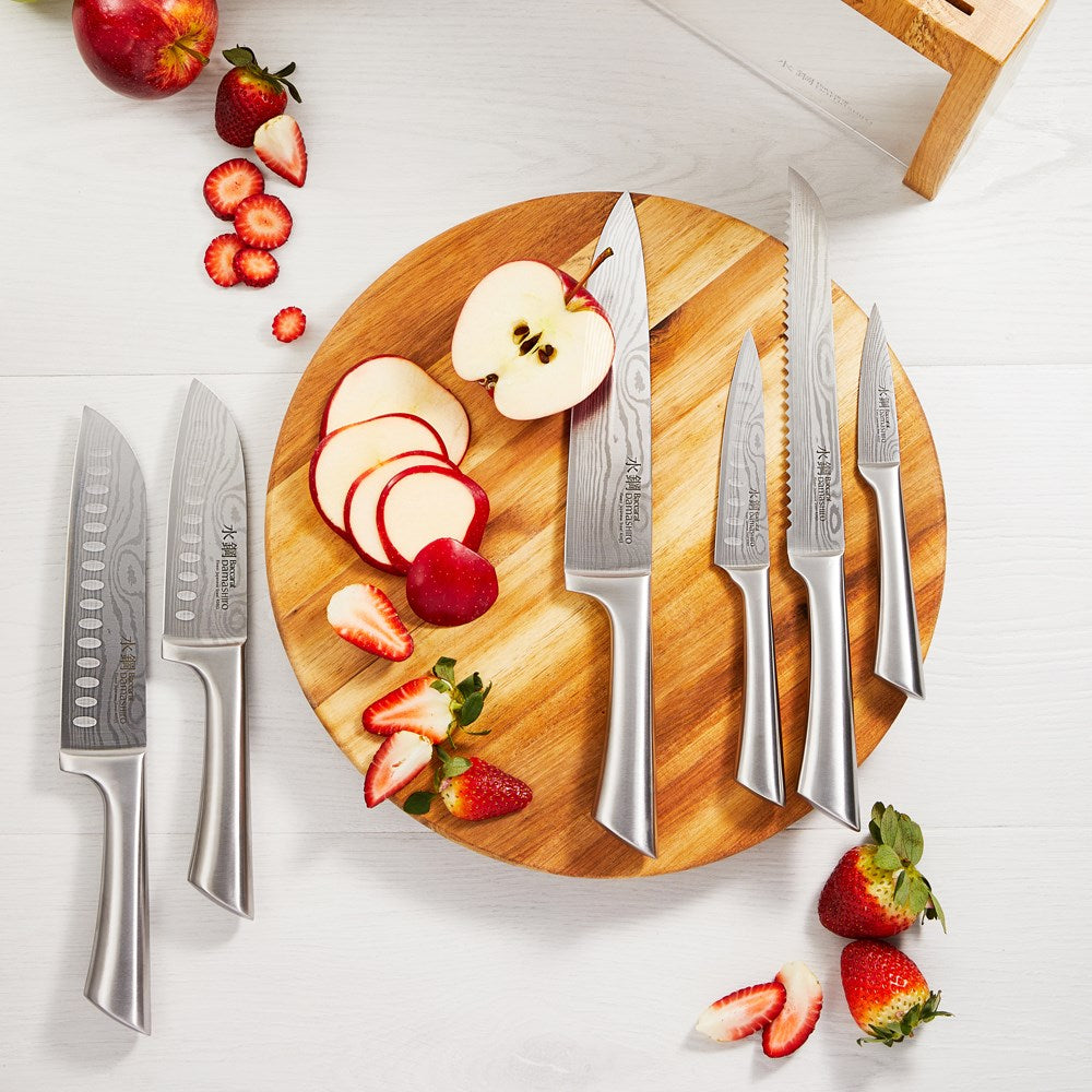 Elegant wooden board displaying sliced apples and strawberries with knives - Baccarat Damashiro Mizu