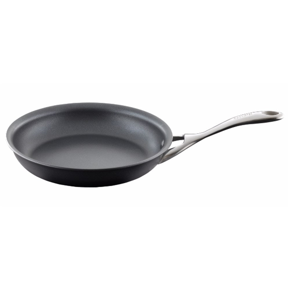 Cooked shrimp with herbs and a lime wedge in a hard anodised frypan 16cm - Baccarat