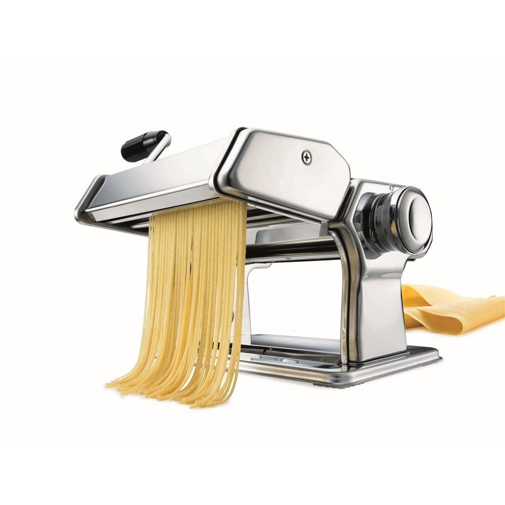 A pasta maker with fresh sheets and garlic on a table - silver pasta machine - Baccarat 150mm ii