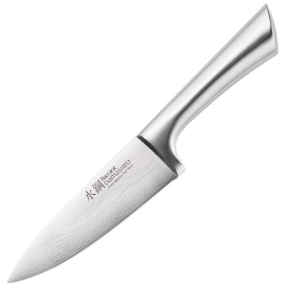 A Baccarat Damashiro Mini chef knife in a protective box with a polished blade and ergonomic handle