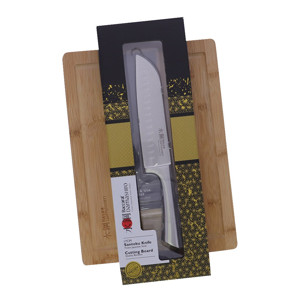 Sliced sandwich on a wooden board with a knife cheese and fresh ingredients - Baccarat damashiro