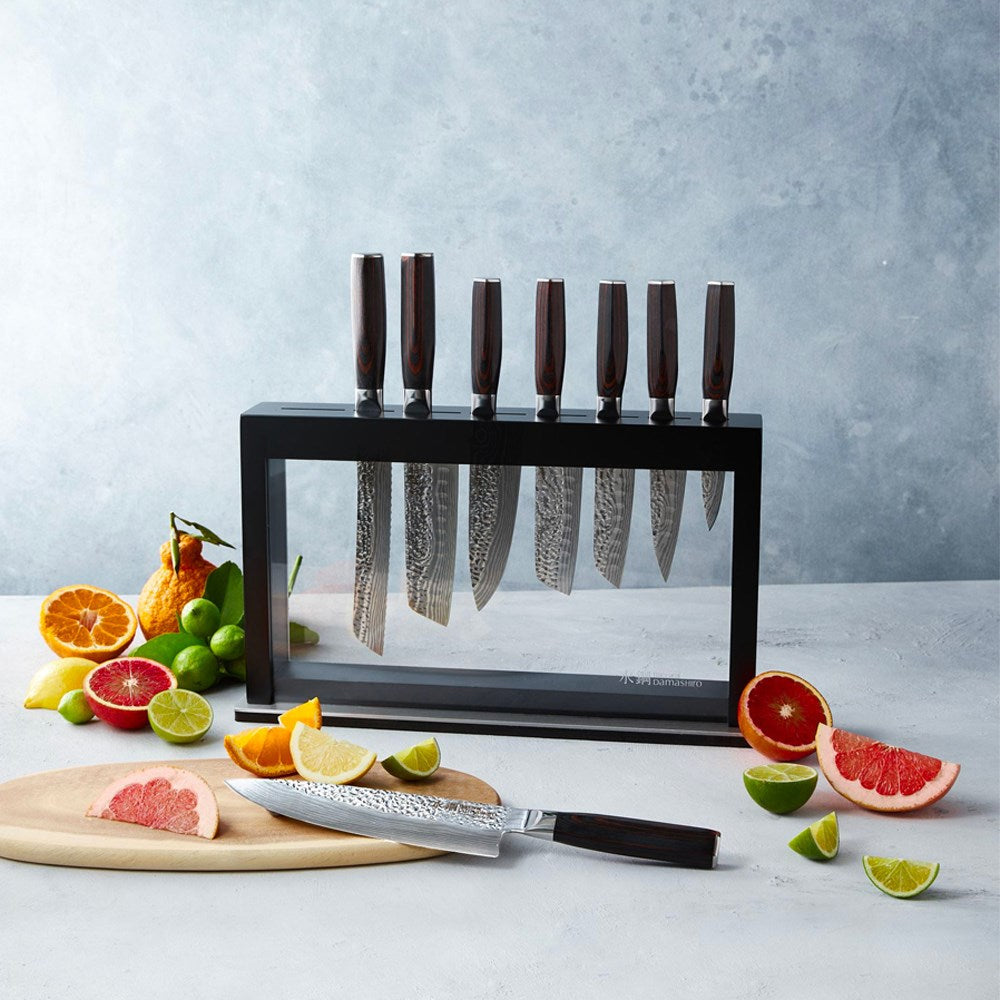 nine piece knife block with sleek black handles and shiny blades - Baccarat damashiro emperor hisa