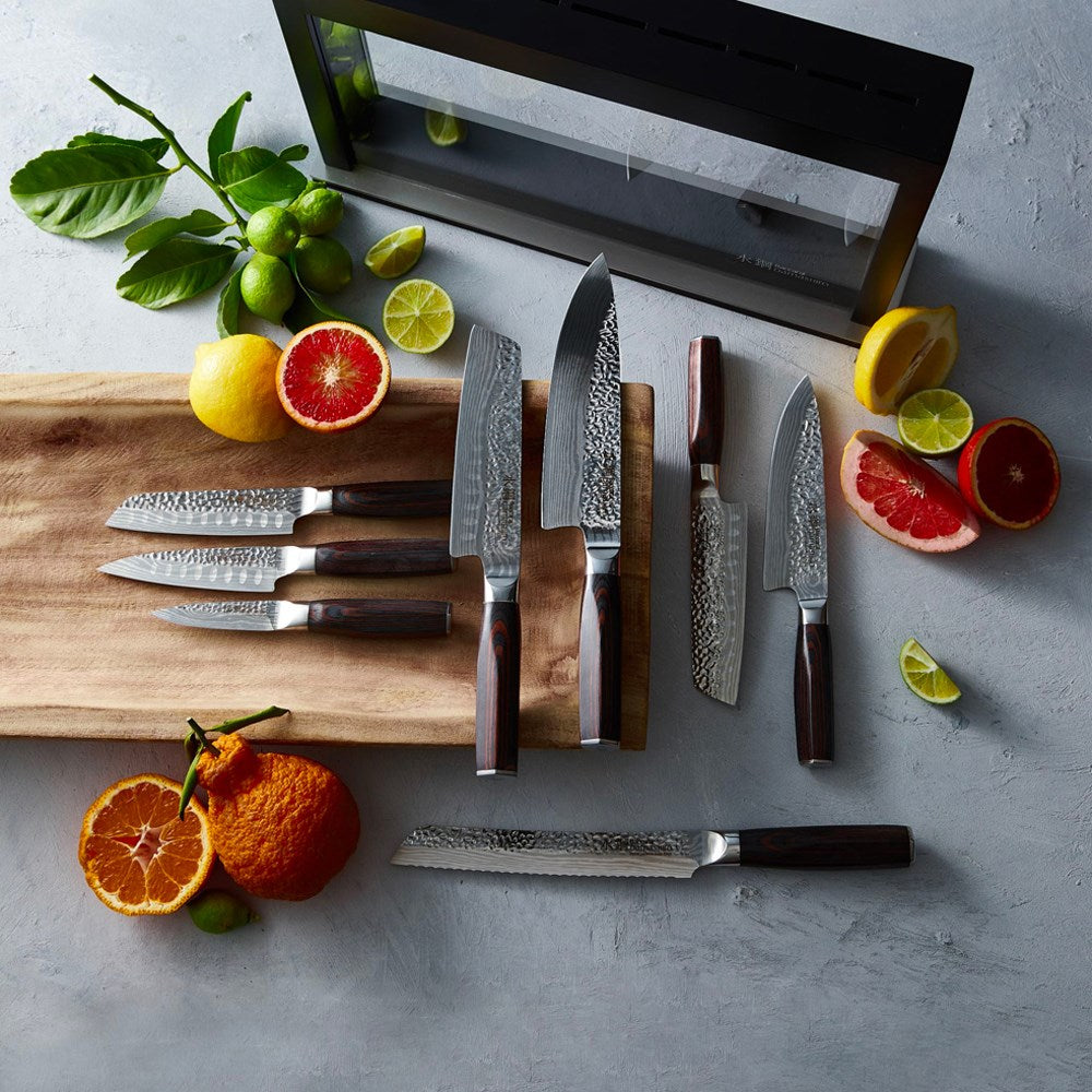 nine piece knife block with sleek black handles and shiny blades - Baccarat damashiro emperor hisa
