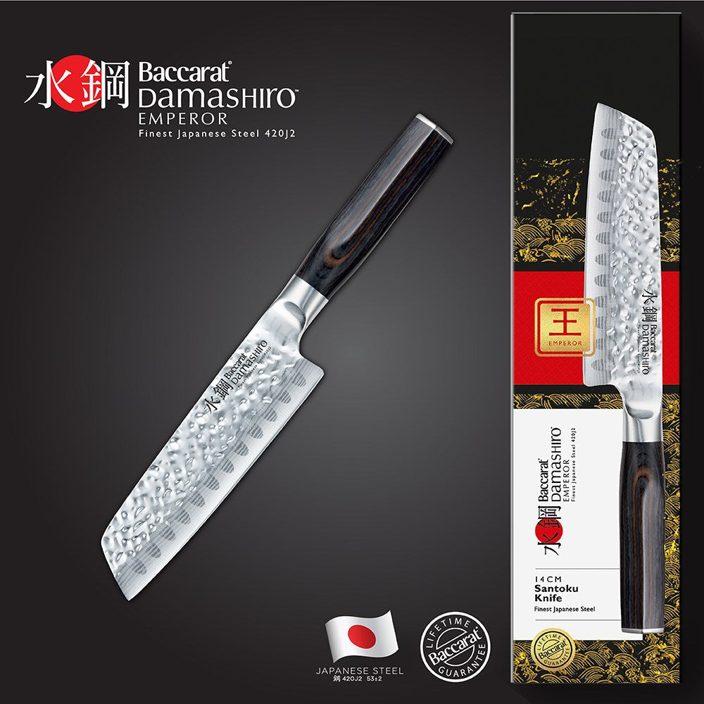 Close-up of a sleek santoku knife with a polished blade and dark wood handle - Baccarat Damashiro