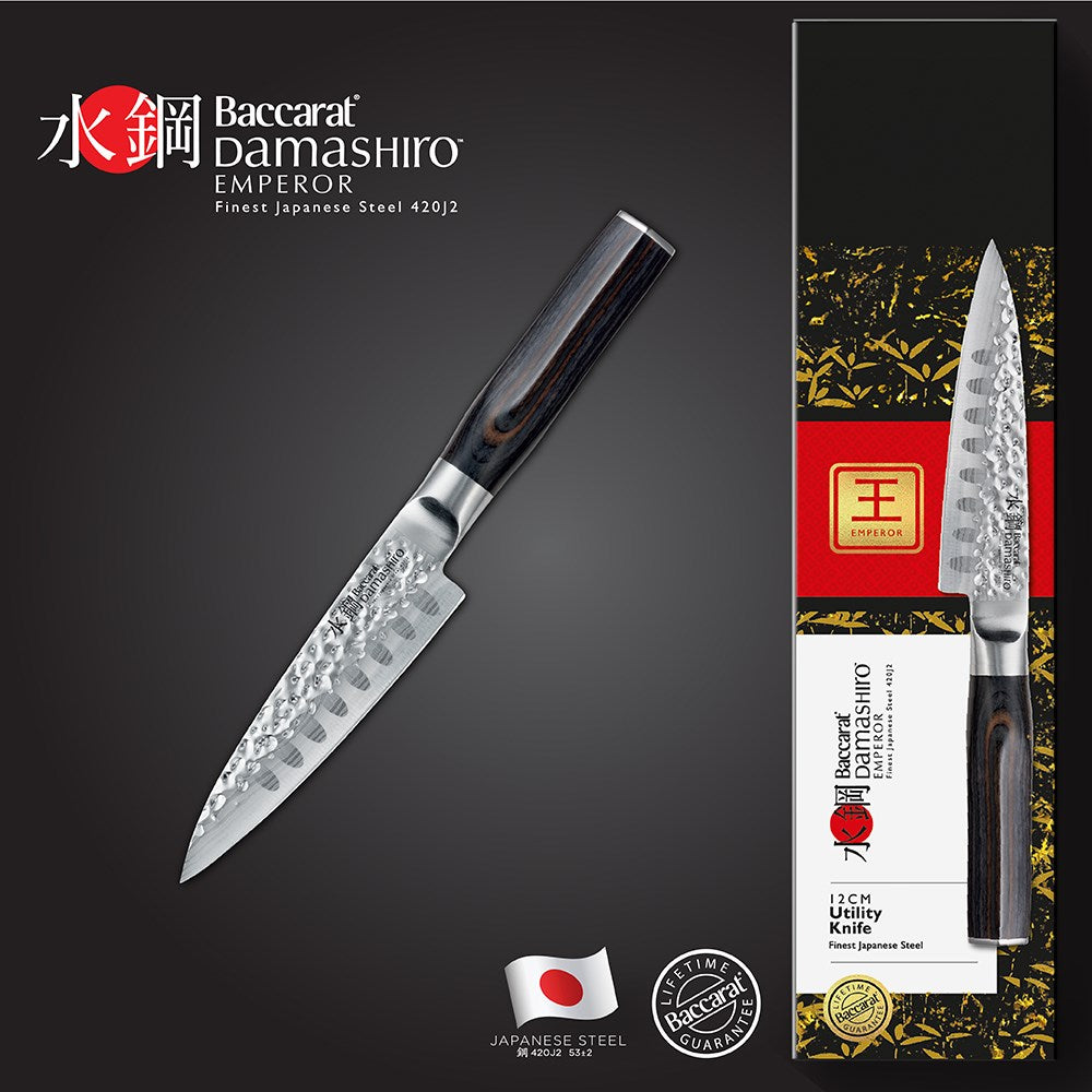 A sleek beautifully crafted carving knife with a fine edge and ergonomic handle - Baccarat Damashiro