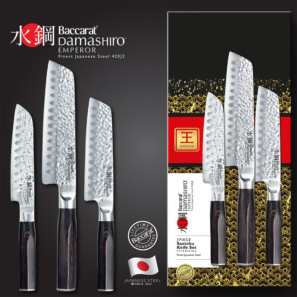 A decorative box with 3-piece knives featuring silver blades and dark handles - Baccarat damashiro