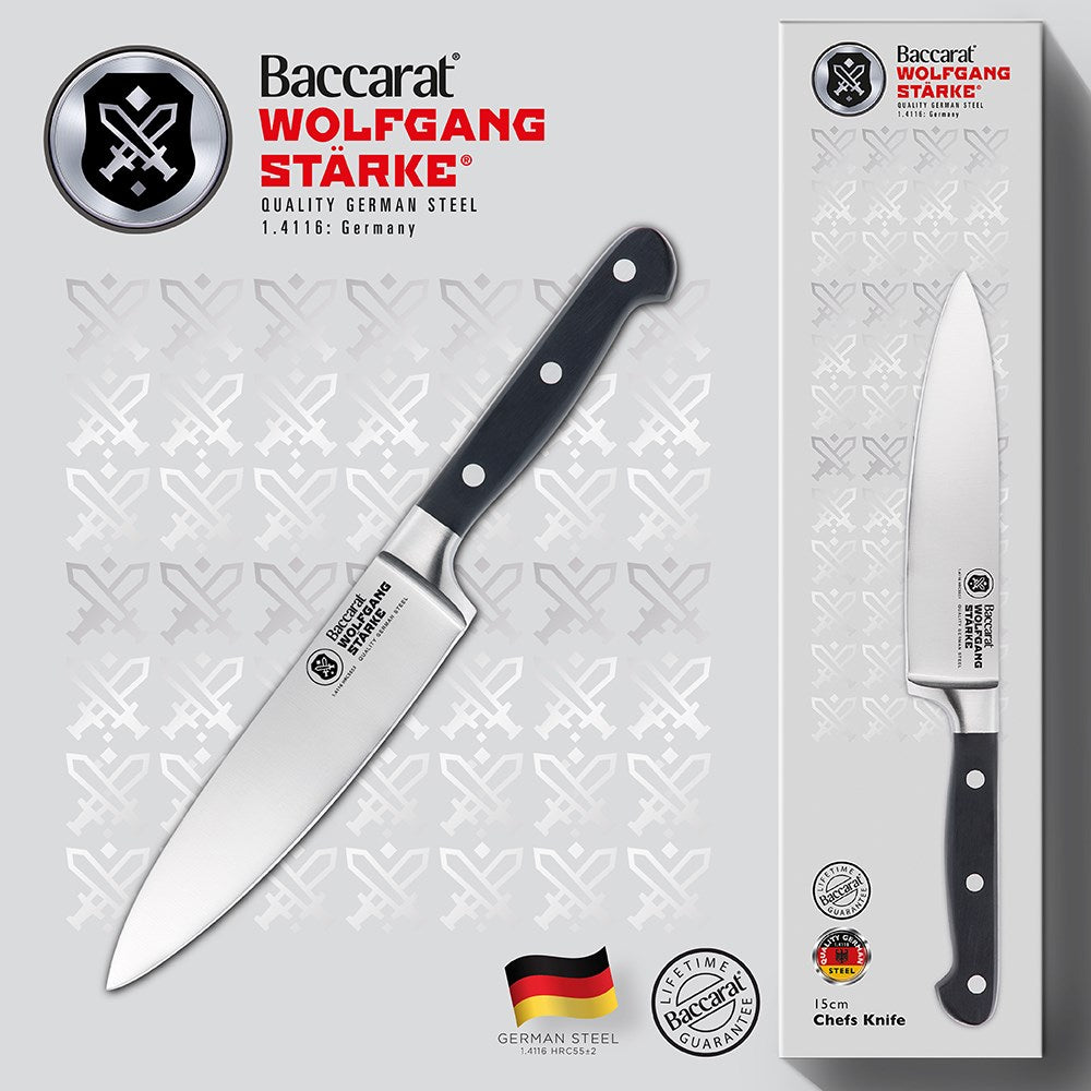 Stainless steel santoku knife with black handle on light grey background - Baccarat Wolfgang Starke