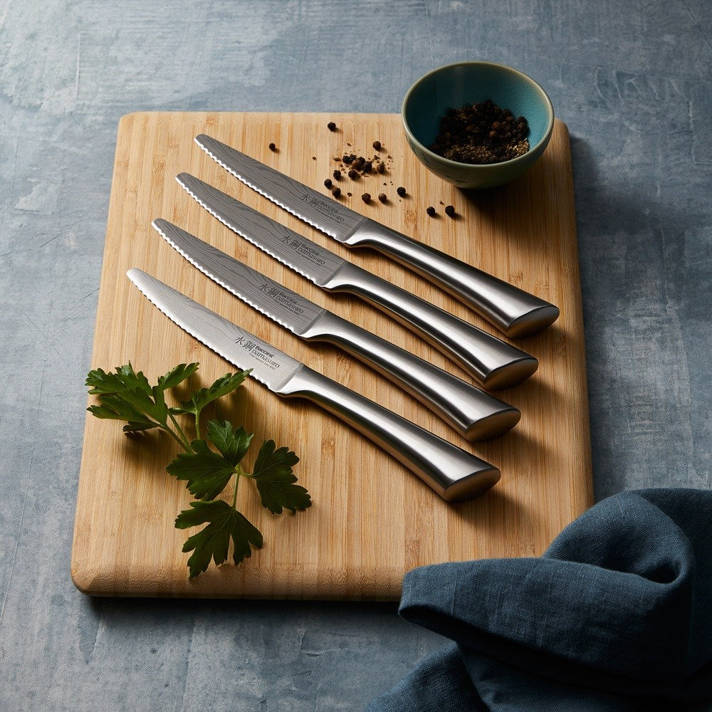 Four knives on a wooden cutting board with herbs and spices - Baccarat damashiro filleting knife cm