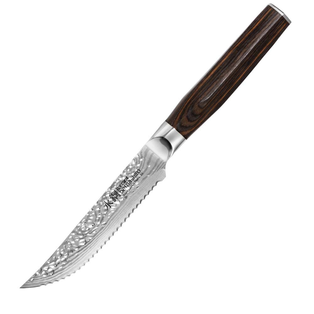 Marbled tomahawk steak with four elegant knives on a dark stone surface - Baccarat damashiro emperor