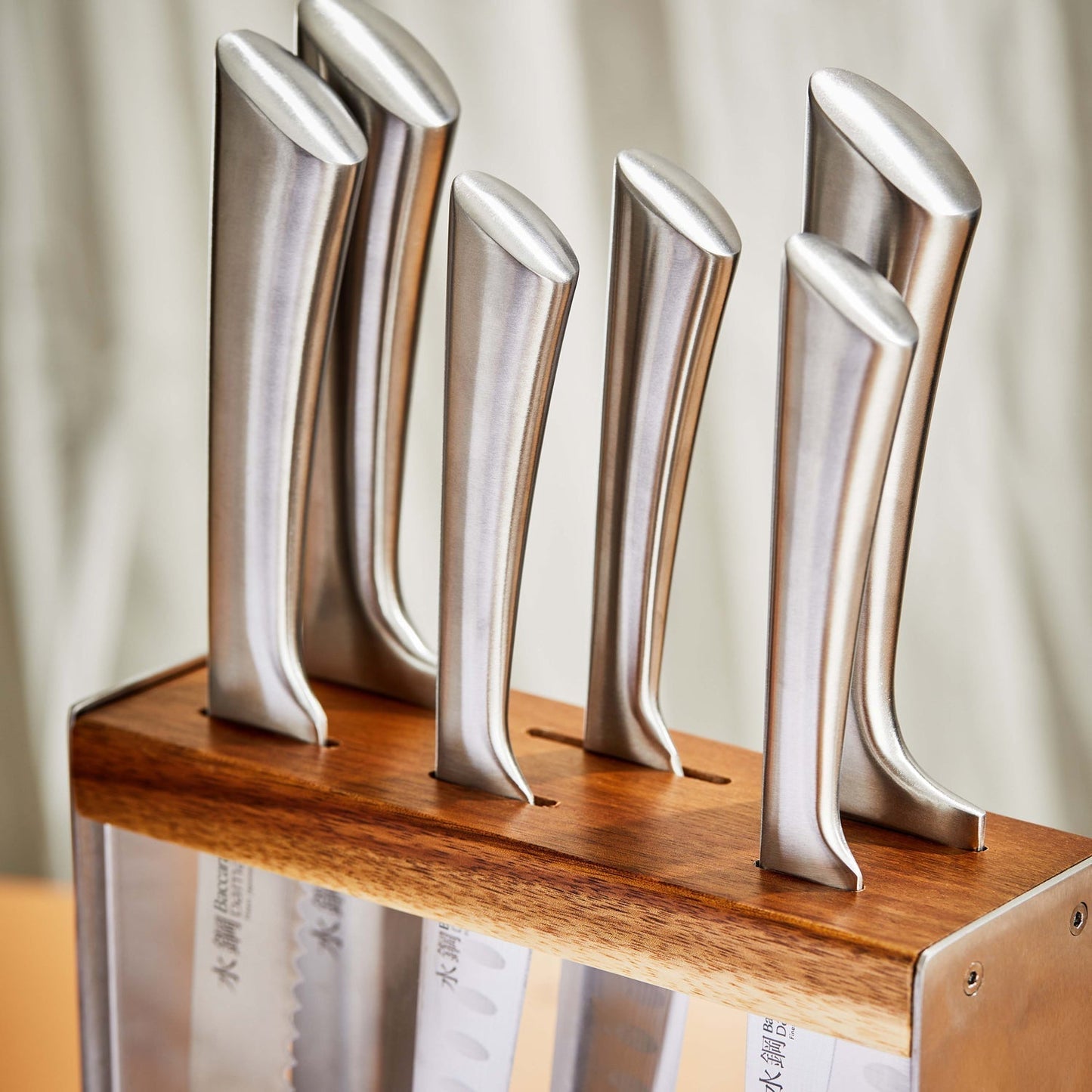 A stunning knife block showcasing sharp elegant blades in fine wood - Baccarat damashiro kinzoku