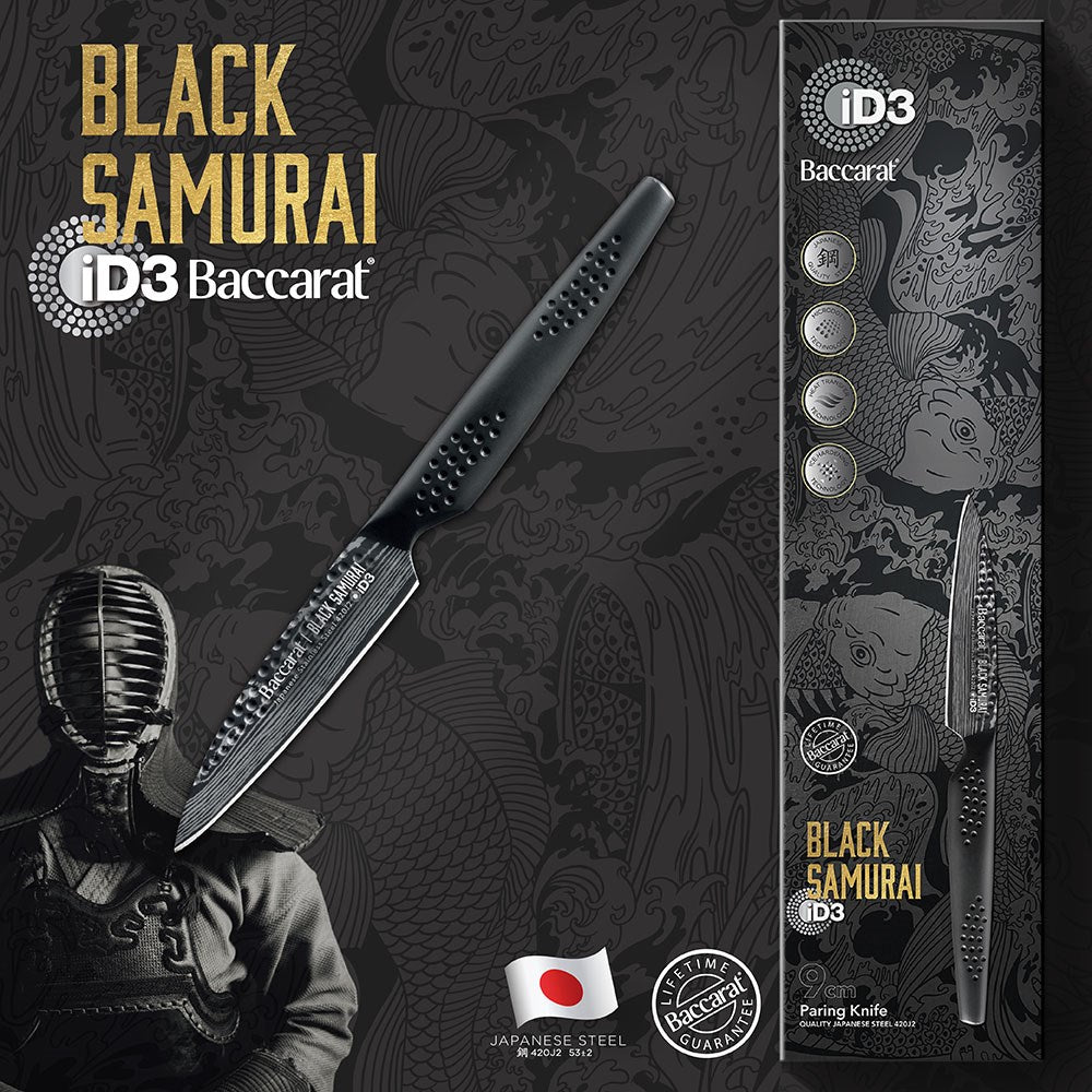 Six elegant Baccarat id3 Black Samurai Paring Knife 9cm arranged with green peas on marble