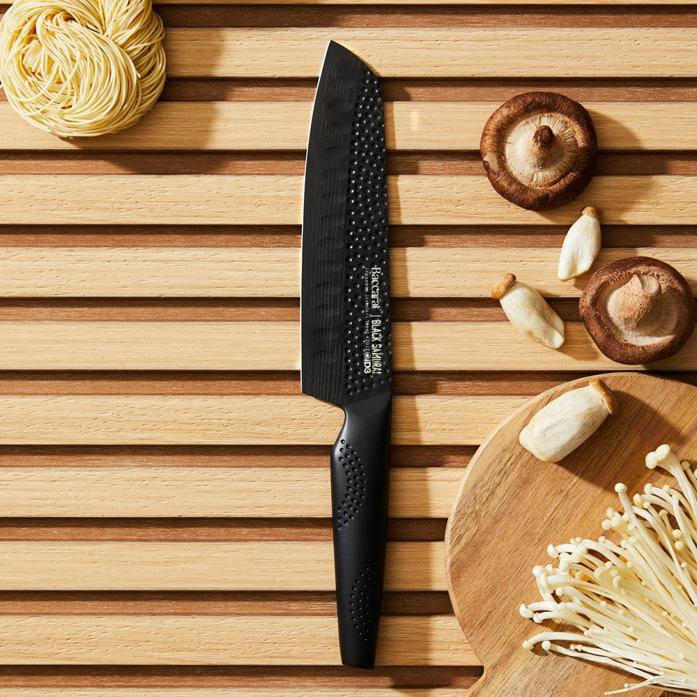 A sharp 11cm utility knife with a textured handle for precision cutting - Baccarat id3 black Samurai
