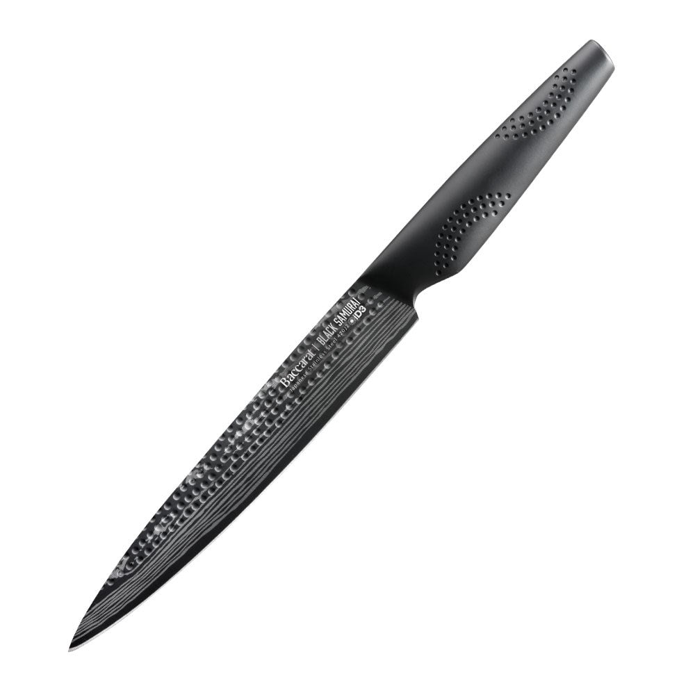 A sharp chef's knife with a black blade and textured handle perfect for precision cutting - Baccarat