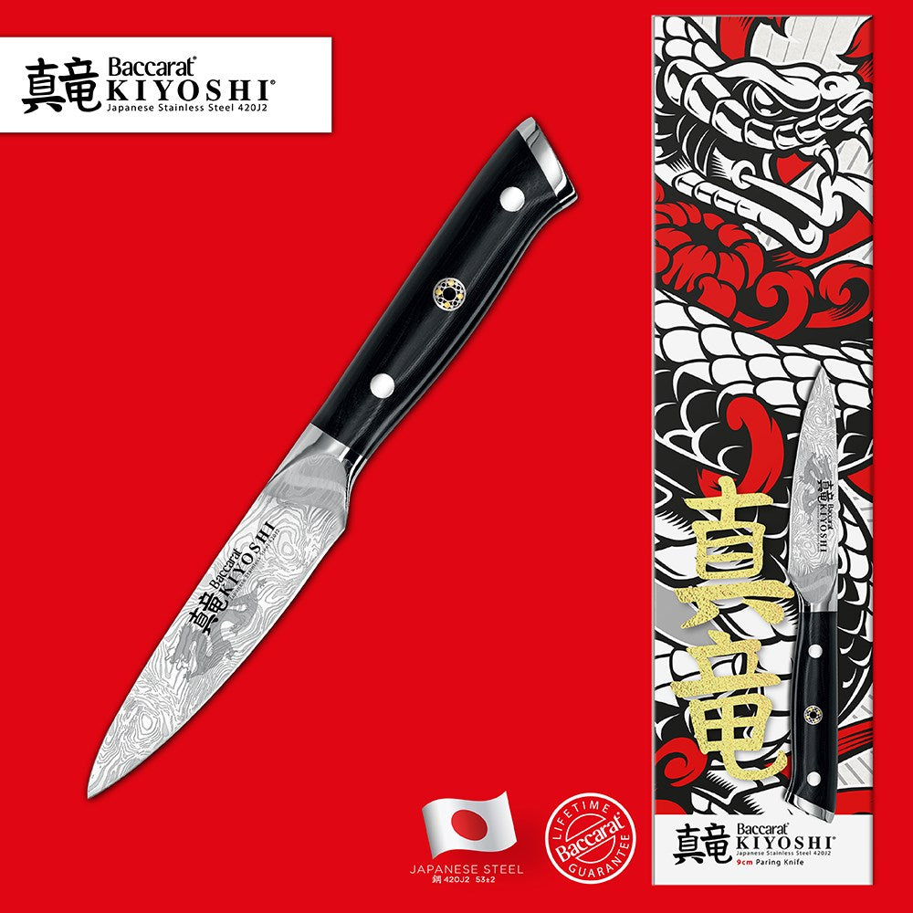 Beautiful Baccarat kiyoshi paring knifes 9cm on a textured surface with decorative fruits - Baccarat