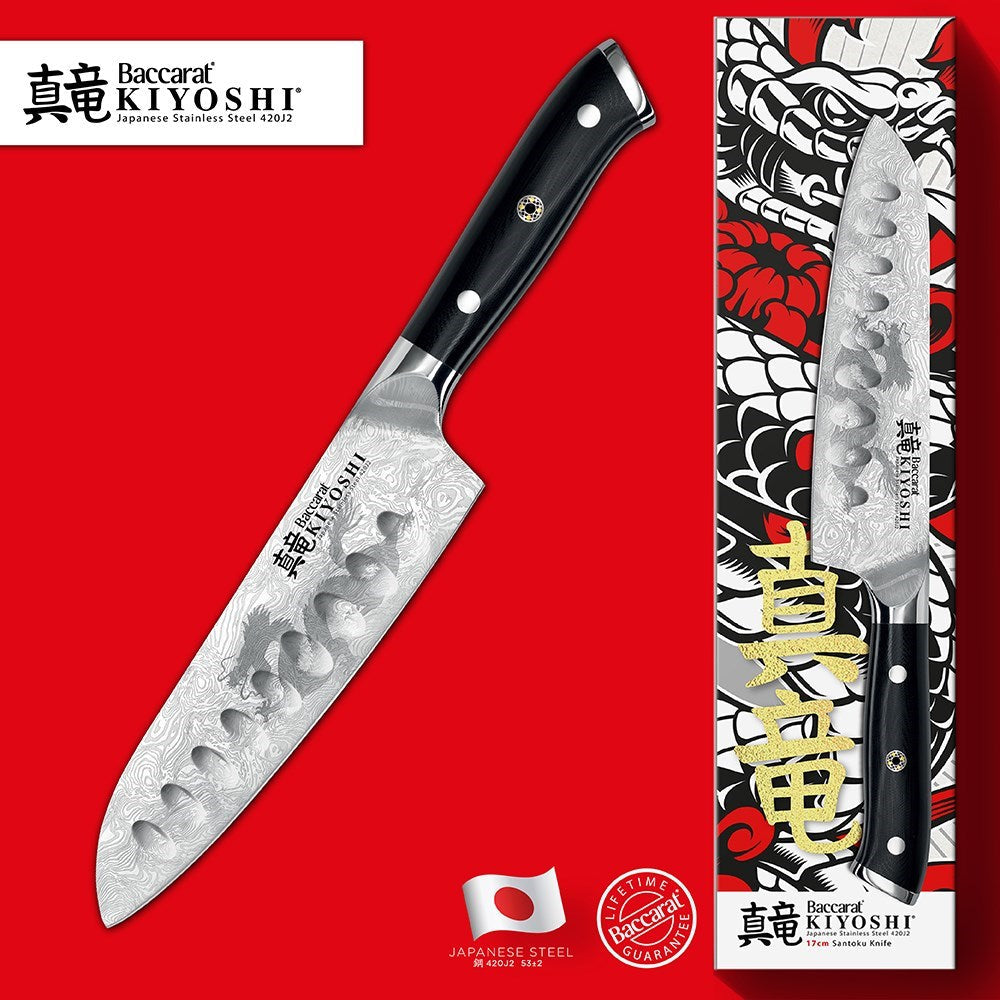 Sliced red potatoes on a wooden board with herbs and oil - Baccarat kiyoshi santoku knife 15cm